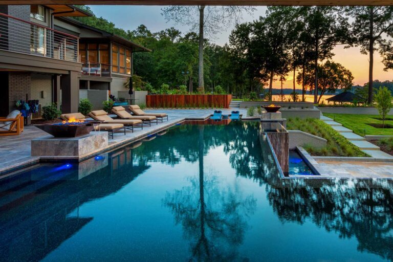 photo of backyard design waterfall pool in PebbleTec Black Pearl Pool Finish