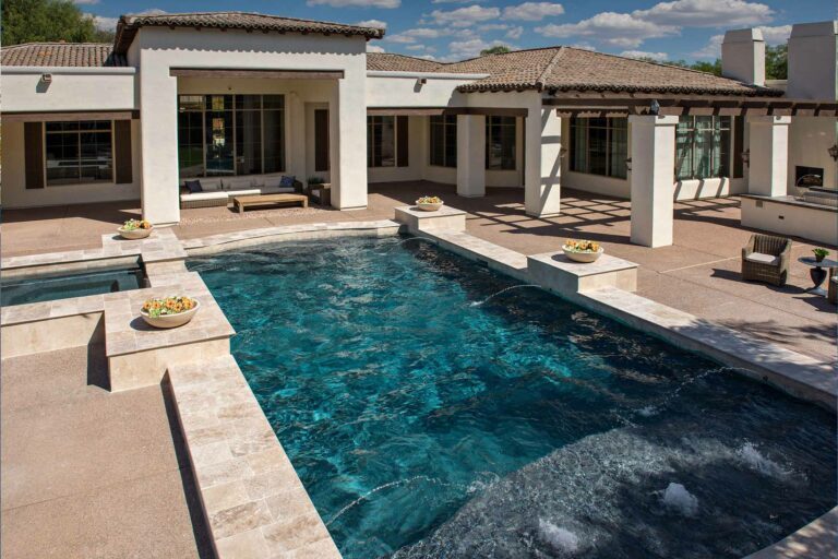 photo of a backyard pool design in PebbleTec PebbleBrilliance Majestic Sound Pool Finish medium blue water color