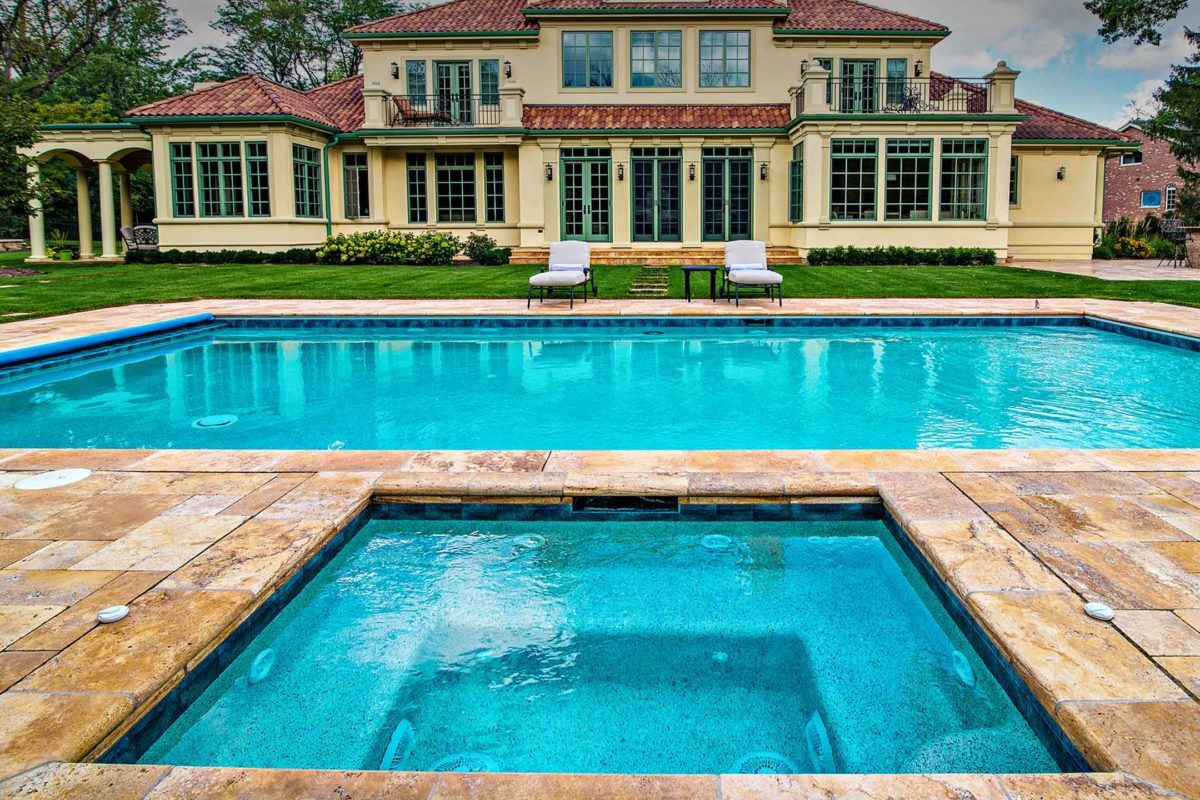 photo of a backyard pool design in PebbleTec Soft White Pool Finish light blue water color by Barrington Pools Inc submitted for World's Greatest Pools 2016