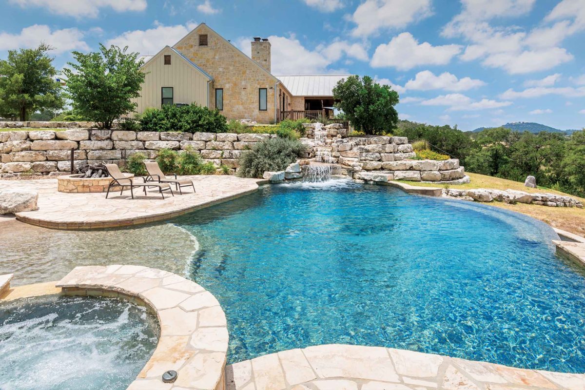 photo of a backyard pool design in PebbleTec Tahoe Blue Pool Finish medium blue water color with waterfall feature by Keith Zars submitted for World's Greatest Pools 2015