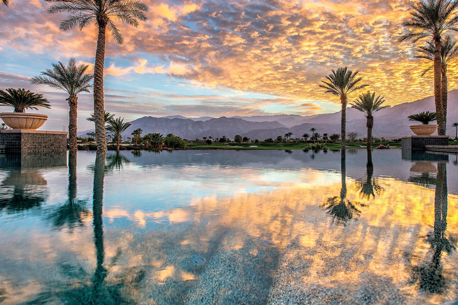 photo of a resort pool at sunrise in PebbleTec Tahoe Blue Pool Finish water color for World's Greatest Pools 2015