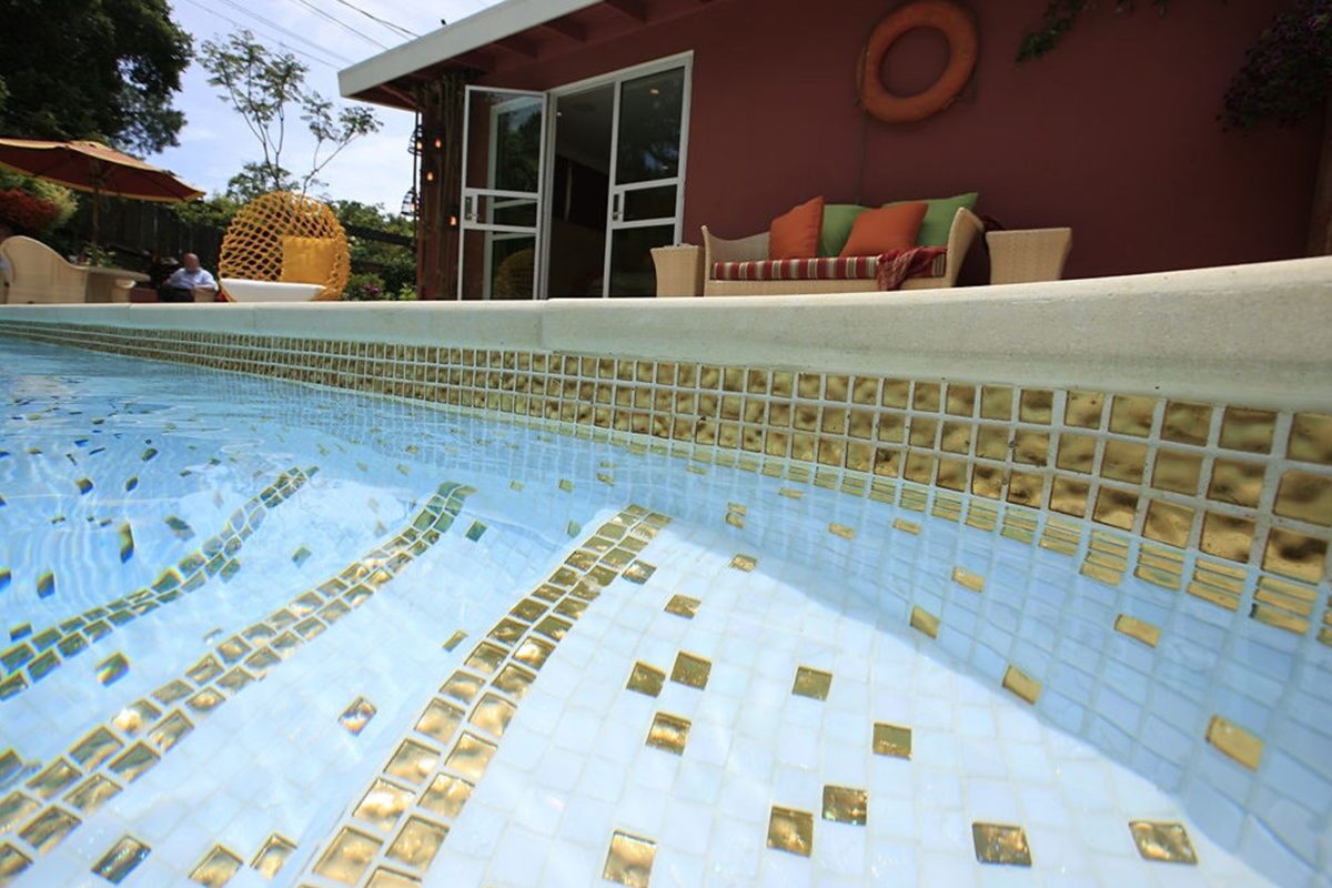 R1C Absolute White 1x1 with gold accents all tiled pool