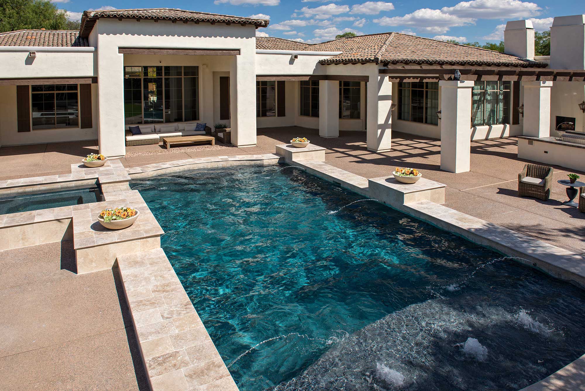 photo of a backyard pool design in PebbleTec PebbleBrilliance Majestic Sounds Pool Finish medium blue water color
