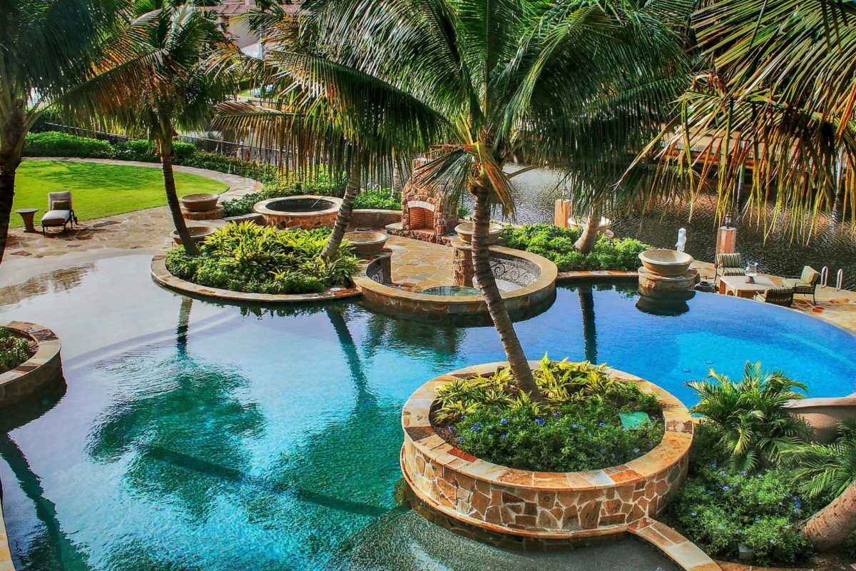 photo of a backyard pool design in PebbleTec PebbleBrilliance Deep Cove Pool Finish medium blue water color submitted for World's Greatest Pools 2017